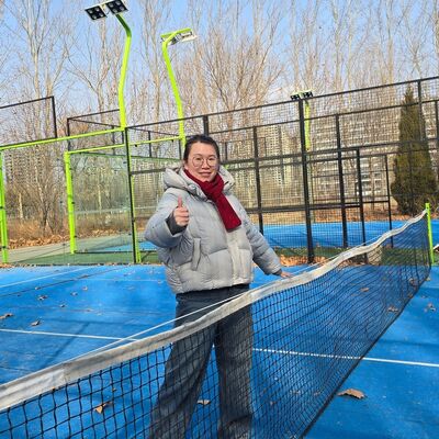 Outdoor Padel Court Equipped With 18 Tempered Glass Panels 50x50mm Mesh Frame IP65 Rated LED Flood Lights For Night Play Capability